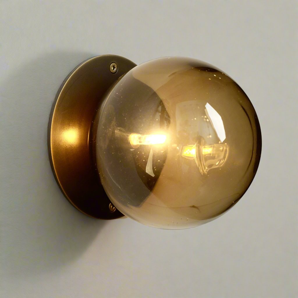 Glass globe wall sconce